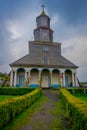 CHILOE, CHILE - SEPTEMBER, 27, 2018: Outdoor view of historic church of Nercon, catholic temple located in the chilota