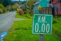 CHILOE, CHILE - SEPTEMBER, 27, 2018: Outdoor view of informative sign of starting point of distance in Chacao in Chile