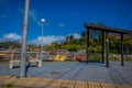 CHILOE, CHILE - SEPTEMBER, 27, 2018: Outdoor view of pier with some colorful palafitos in the horizont in Castro, Chiloe Royalty Free Stock Photo