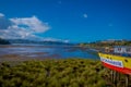 CHILOE, CHILE - SEPTEMBER, 27, 2018: View of beautiful colorful wooden restaurant cebiche on stilts palafitos, in a low Royalty Free Stock Photo