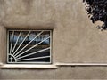 Window with cross in Chimayo, New Mexico