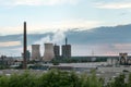 Chimney and cooling towers with pollution, steel production industry in Duisburg with blast furnaces, coke oven and power plant, Royalty Free Stock Photo