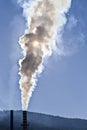 Chimney expelling pollutant gases to the air Royalty Free Stock Photo