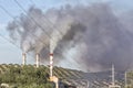 Chimney expelling pollutant gases to the air