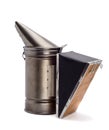 Chimney for flashing bees. The beekeeper`s tool. Bee smoker smoking. Royalty Free Stock Photo