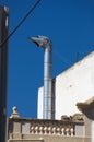 Chimney for heating in a house in the center of the city Royalty Free Stock Photo