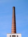 Chimney in old industrial complex. Royalty Free Stock Photo