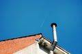 Chimney on the rooftop of the house in the city