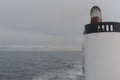 Chimney on a sailing ferry ship with quiet ocean and dark sky on open sea Royalty Free Stock Photo