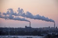 Chimney smoking stack on sunrise. Air pollution and climate change theme.