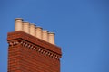 Chimney stack against a clear blue sky Royalty Free Stock Photo