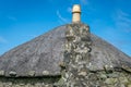 A chimney stack of a thatched round house Royalty Free Stock Photo