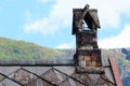 Chimney on a stone church roof, Norway Royalty Free Stock Photo