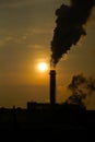 The chimney of a thermal power plant, the smoke extracted by a thermal power plant on the chimney, in the production process. Envi