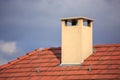 The chimney on top of a red roof Royalty Free Stock Photo
