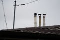 Chimneys in a house. exhaust gas from the stove. daytime photography. detail.