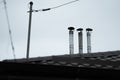 Chimneys in a house. exhaust gas from the stove. daytime photography. detail.