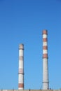 Chimneys large plant against the blue sky