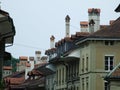 Chimneys on the roofs of residential houses in the center of Bern