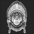 Chimpanzee, portrait. Monkey face. Ape head. Indian tribal traditional headdress with feathers.