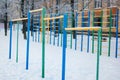 Chin-up bars covered with heavy snow close-up Royalty Free Stock Photo