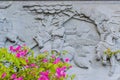 China architecture and flowers on foreground