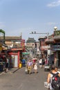 China, Beijing. Shopping street Yandai Xiejie. In the background, Bell Tower