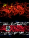 China, Chinese vs Costa Rica, coat smoky mystic flags placed side by side. Thick colored silky abstract smoke flags