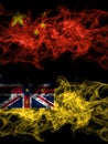 China, Chinese vs New Zealand, Niue smoky mystic flags placed side by side. Thick colored silky abstract smoke flags