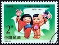 CHINA - CIRCA 1992: A stamp printed in China shows Japanese Girl and Chinese Boy, circa 1992.