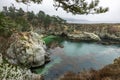 China Cove, Beach in Point Lobos State Natural Reserve, with rock and geological formations along the rugged Big Sur coastline, Royalty Free Stock Photo