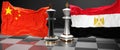 China Egypt talks, meeting or trade between those two countries that aims at solving political issues, symbolized by a chess game