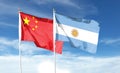 China flag and Argentina flag on cloudy sky. Royalty Free Stock Photo