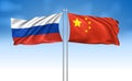 China Flag with Russia Flag with cloudy sky Royalty Free Stock Photo