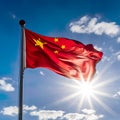 China flag, unfurled in all its glory on a sunny day against the clear blue sky. Royalty Free Stock Photo