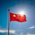 China flag, unfurled in all its glory on a sunny day against the clear blue sky. Royalty Free Stock Photo