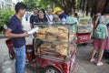 China, Hainan Island, Dadonghai Bay - December 1, 2018: Dadonghai Bay, China bread cakes seller, editorial
