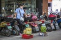 China, Hainan Island, Dadonghai Bay - December 2, 2018: City street, street fruit seller in China, editorial Royalty Free Stock Photo