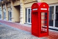 China, Hainan Island, Sanya bay - December 2, 2018: Sanya  city. Traditional red telephone box in London public phone - a symbol Royalty Free Stock Photo