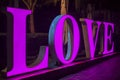 China, Hainan Island, Sanya bay - December 2, 2018: Happy Valentines Day greeting card or banner, Light led letter Love, editorial