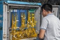 China, Hainan Island, Sanya - December 1, 2018: Fiber Optic Communications Engineer, Internet connection. fiber optic cable splice