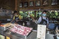 China, Hainan Island, Sanya, - December 1, 2018: The Nanshan, Buddhist Cultural Park; fresh squid barbecue grilled, Close up,