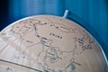 China India and South East Asia countries map in a retro old classic vintage Earth globe in executive management board room Royalty Free Stock Photo