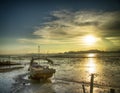 Island sunset with sampan swamp Royalty Free Stock Photo