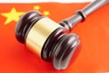 China law, Legal, justice and agreement, wooden court gavel on flag Royalty Free Stock Photo