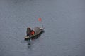 Fishman rowing boat in canoe Lantern Royalty Free Stock Photo
