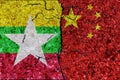 China and Myanmar relations. Myanmar and China flags together