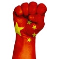 China national flag painted onto a male clenched fist