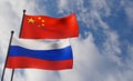 China and Russia flags. Blue sky and flag China and Russia. 3D work and 3D image Royalty Free Stock Photo