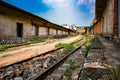 China\'s abandoned red brick factory buildings and freight railway tracks Royalty Free Stock Photo